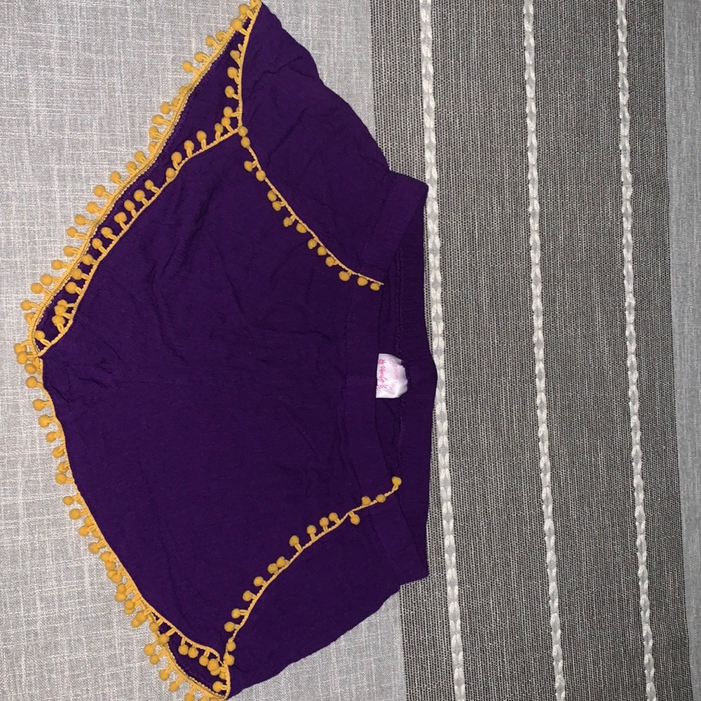 Brand: varsity fashion spy Size: small color: purple and gold